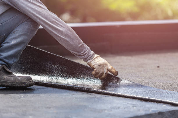 Professional Waterproofing technician working in Islip Terrace, NY